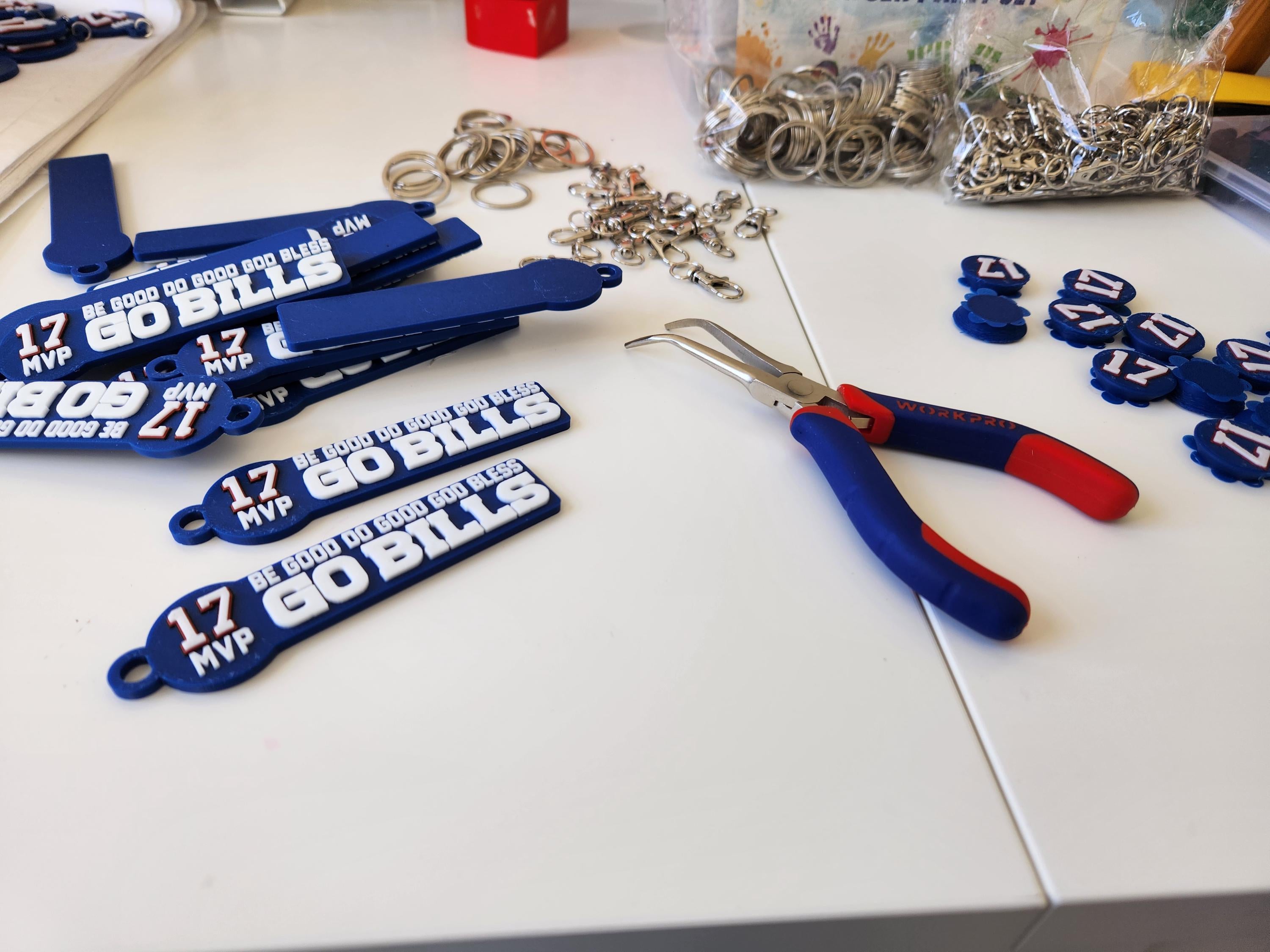 A shot of how the keyrings are hand assembled after being printed.
