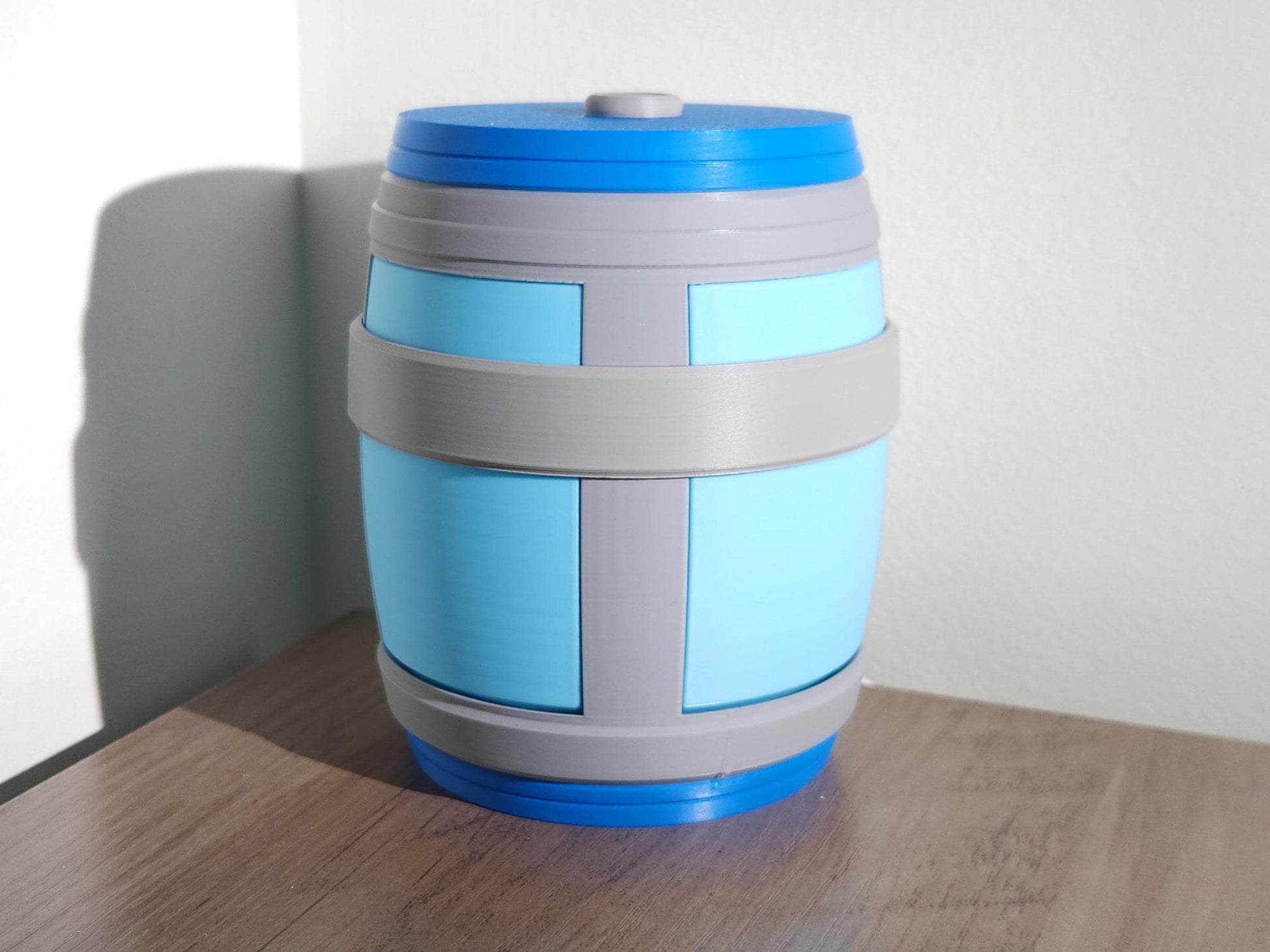A picture of the chug jug lamp in daylight, highlighting it&#39;s details and smooth finish.