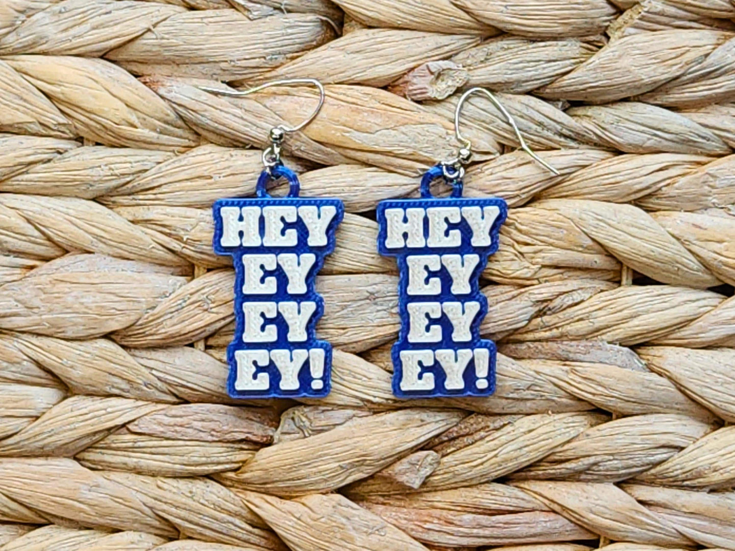 Buffalo Bills blue 3D printed earrings with white “Hey Ey Ey Ey” text – fun and bold NFL supporter earrings for spirited fans.