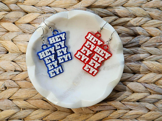 Red and blue “Hey Ey Ey Ey” earrings inspired by Buffalo Bills touchdown song – unique 3D printed football earrings for sports lovers.