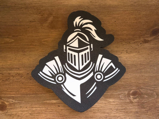 The front of the lamp is pictured on a wooden background. The lamp is black and white and features a knight mascot.