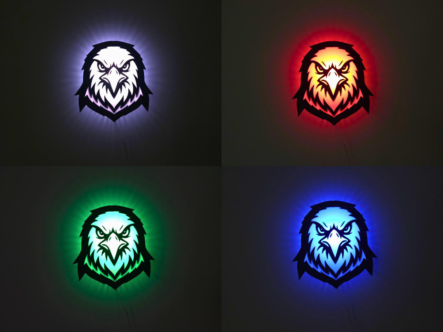 The eagle, hawk or falcon lamp is shown illuminated in four colors: white, red, green and blue on a wall with the lights off.